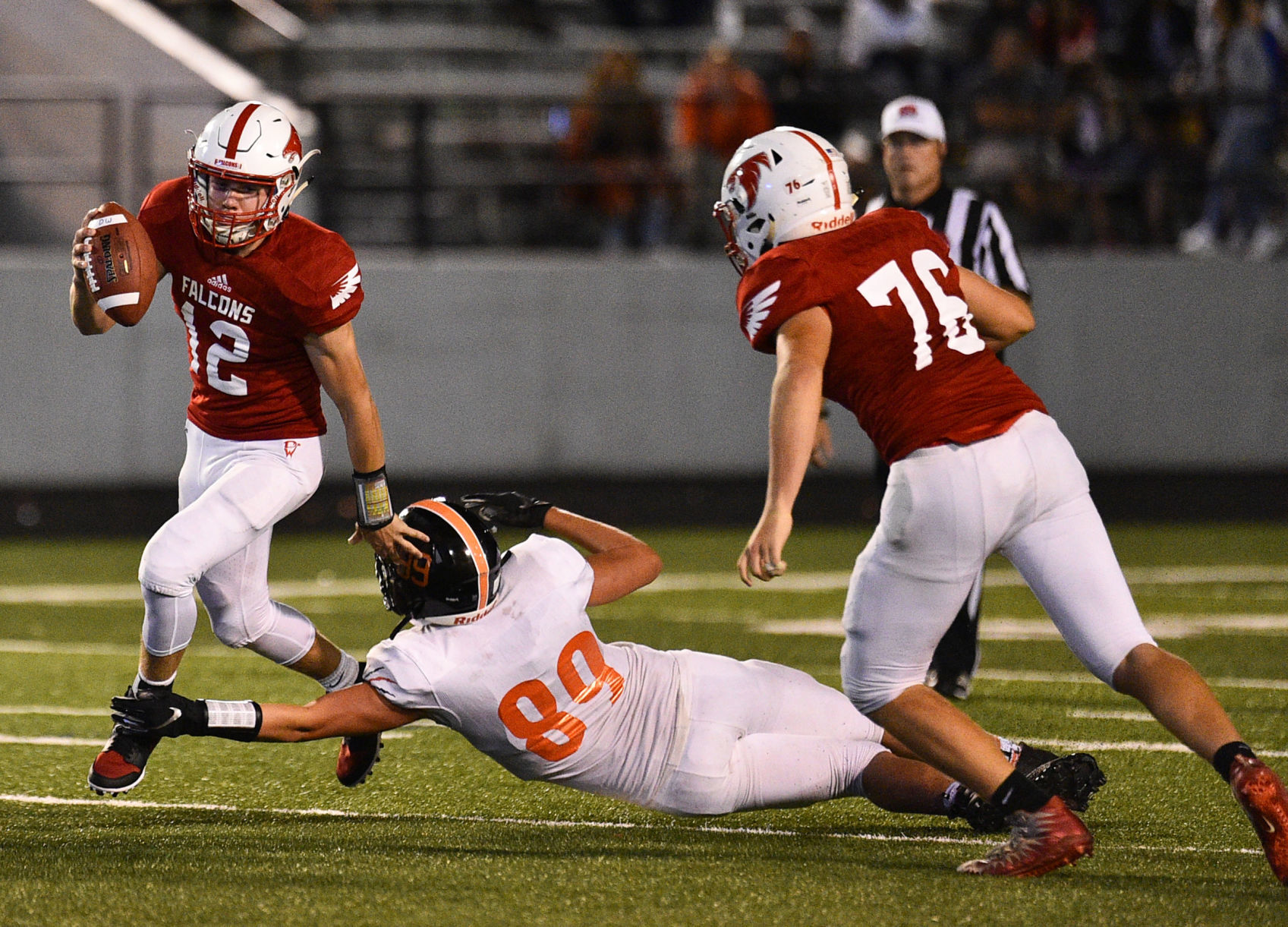 083019-qct-spt-ut-west-football-140a.jpg
